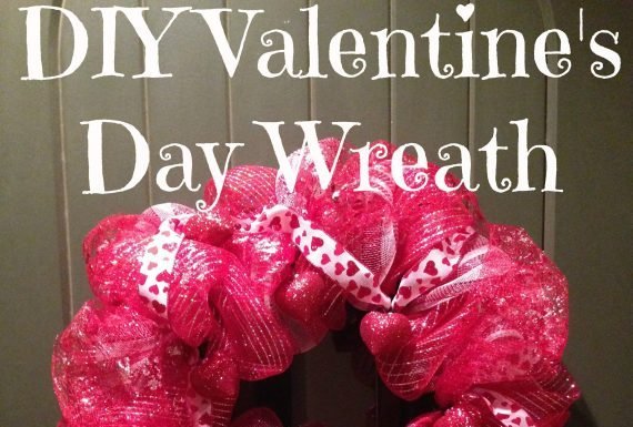 A beautiful, hot pink, large wreath made out of tulle and ribbon.