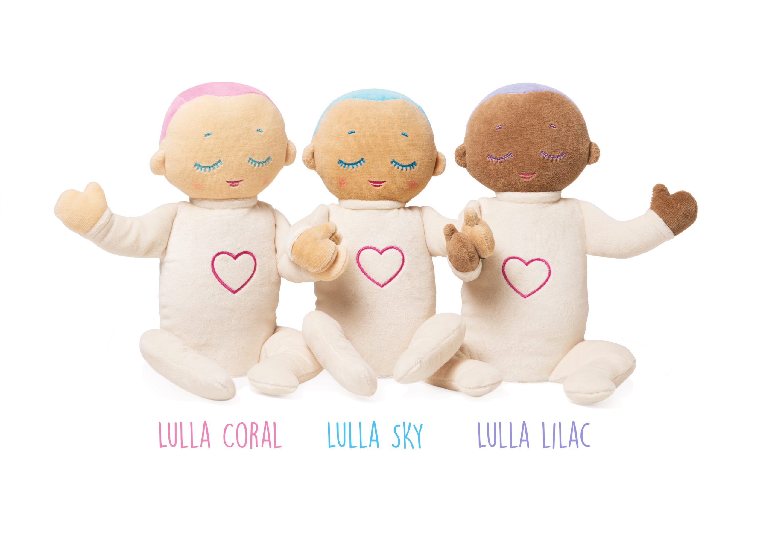 Three Lulla dolls sitting in a row