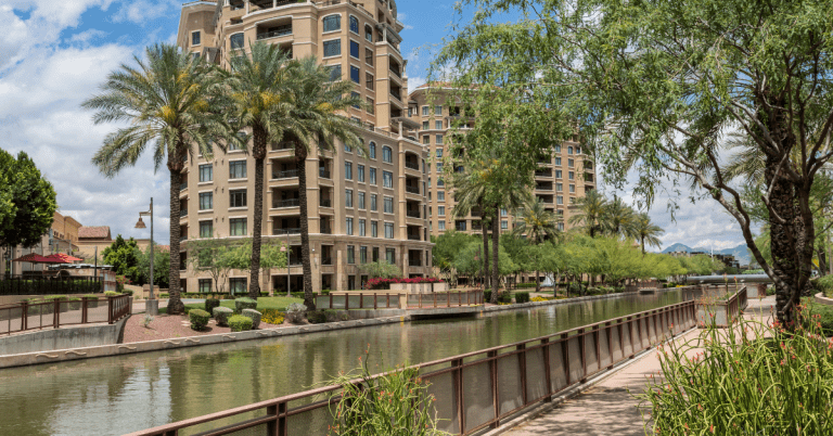 A daytime image of the waterfront in Scottsdale, Arizona, lined with Palm trees